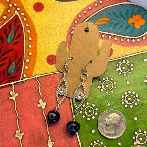 Elegant Silver and Deep Blue Evil Eye Dangle Earrings